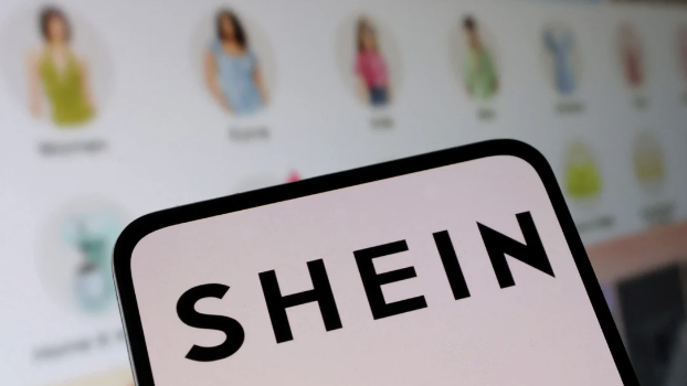 The computer displays Shein's official website, while the mobile phone displays Shein's logo.